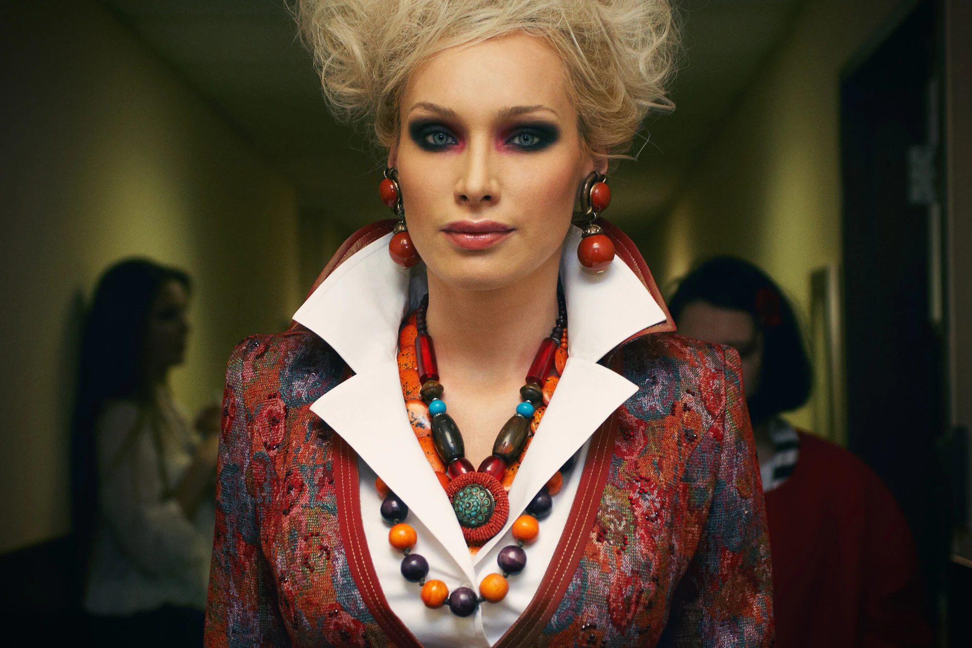 Backstage fashion portrait of Alisa Krylova Miss World in bold designer outfit