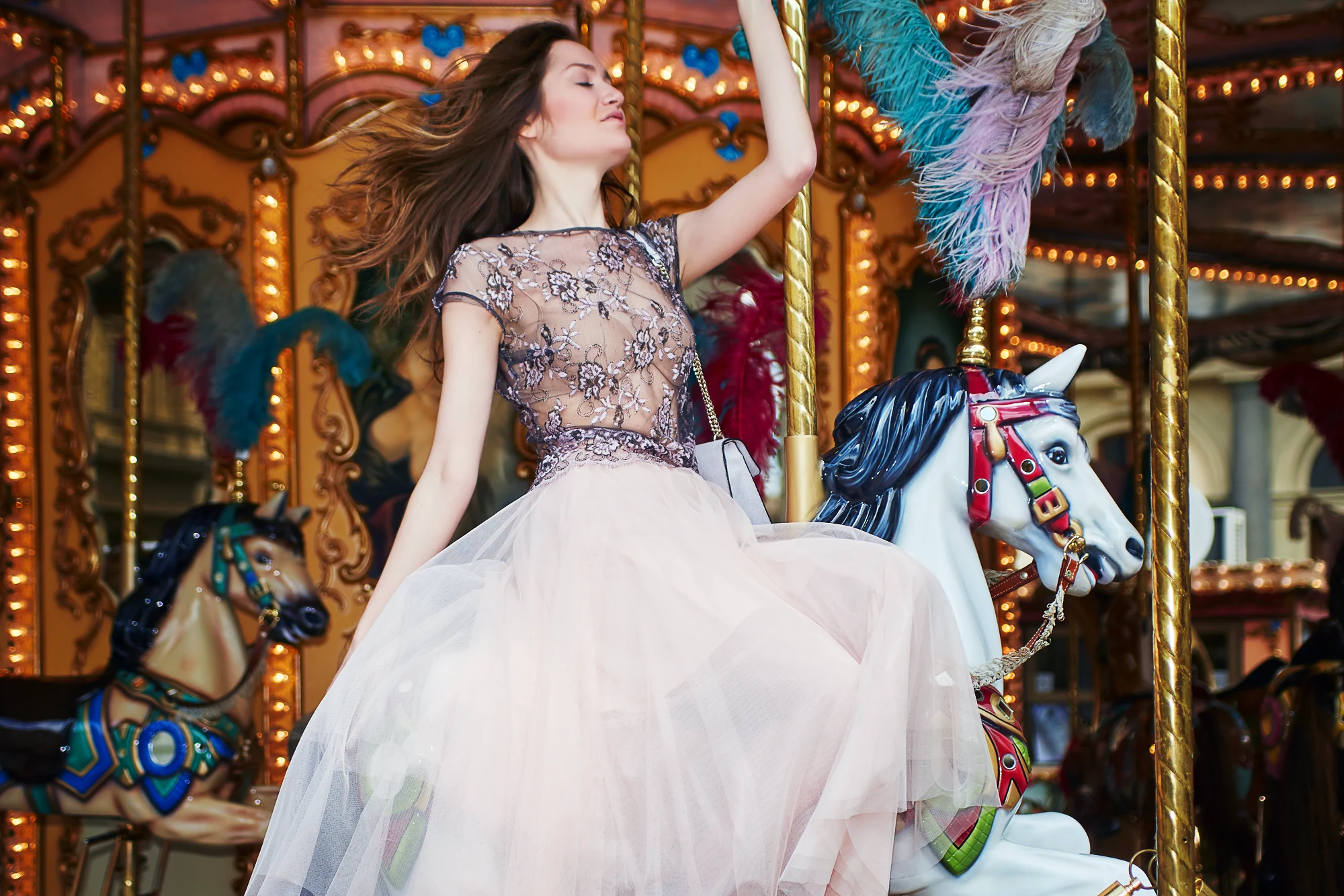 Creative portrait photoshoot in Florence on a carousel