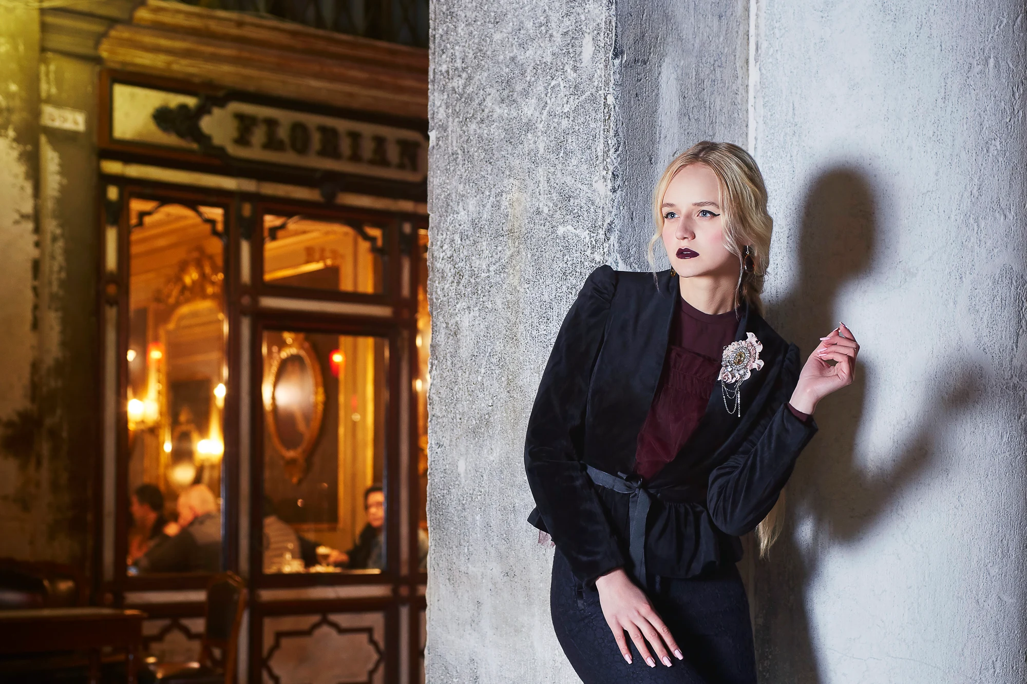 Fashion portrait of a woman near Caffe Florian in Saint Mark’s Square in Venice