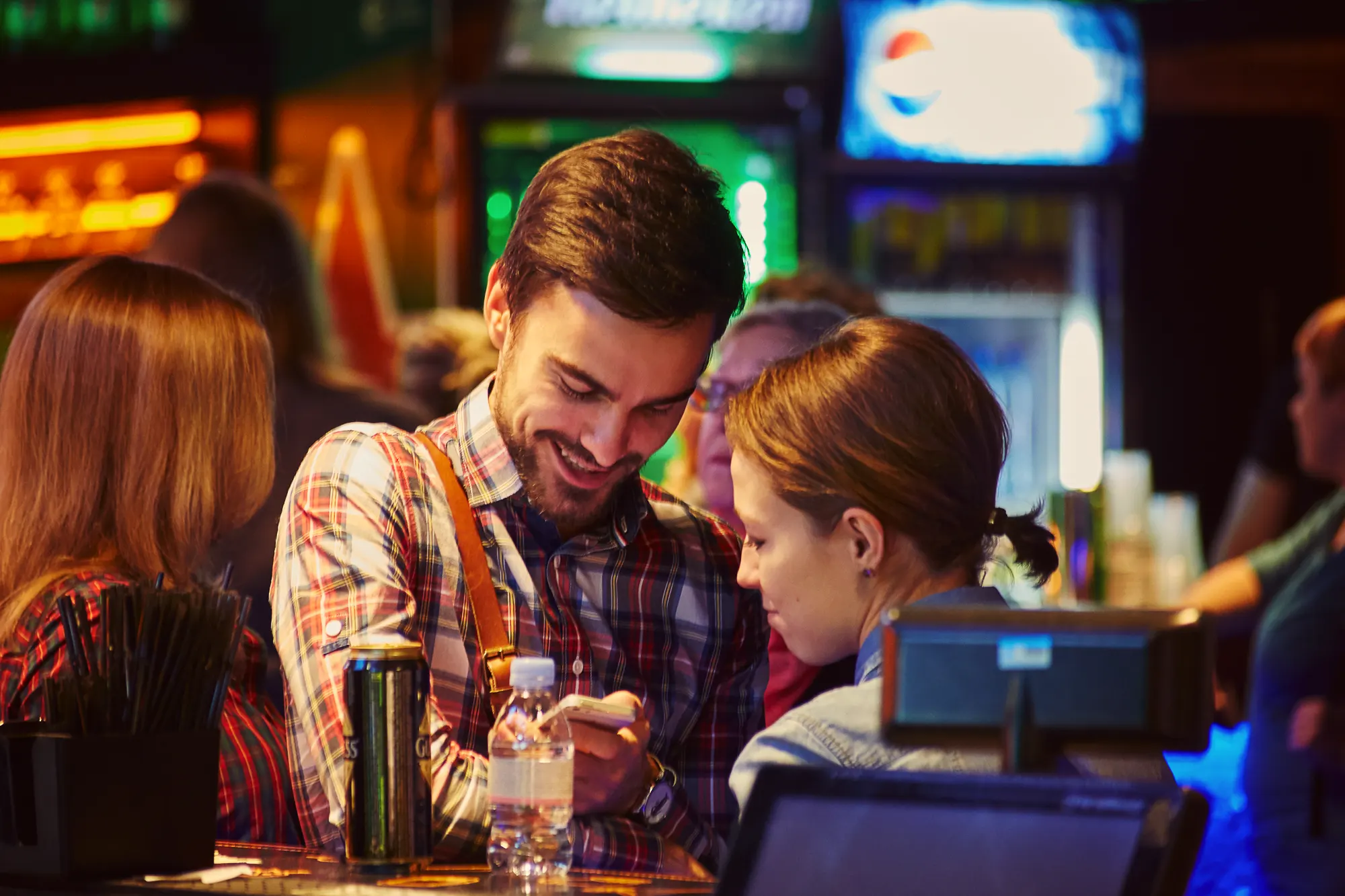 Wedding photographer in Italy capturing candid wedding party moments at bar